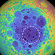 The South-Pole Aitken basin in dark blue. The dotted line outlines the mass anomaly.
